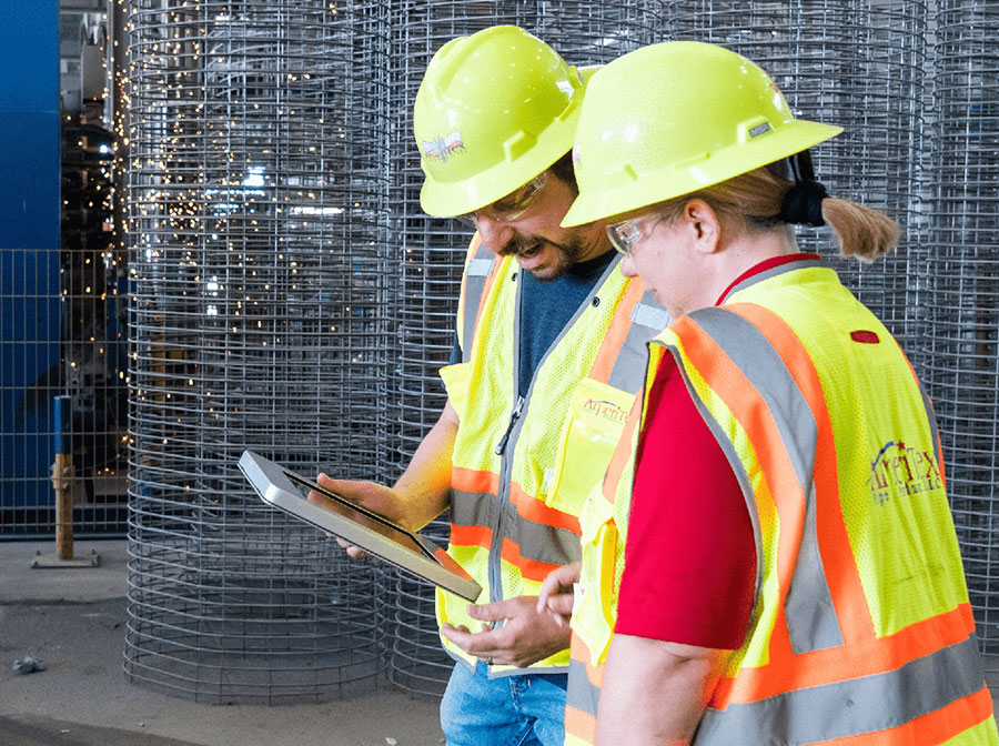 Workers reviewing documents