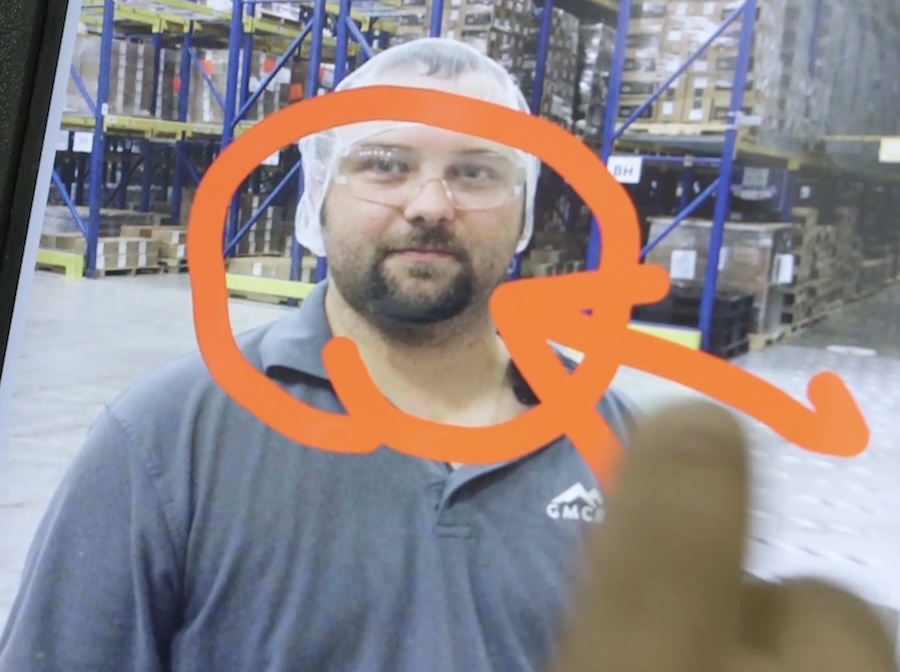 Workers reviewing a document